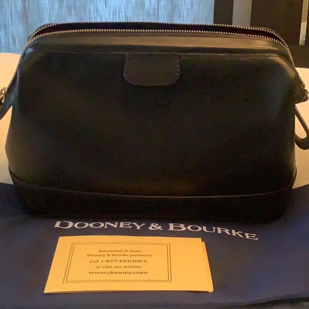 Dooney & Bourk black cosmetic bag size W 10 T 7 D 71/2